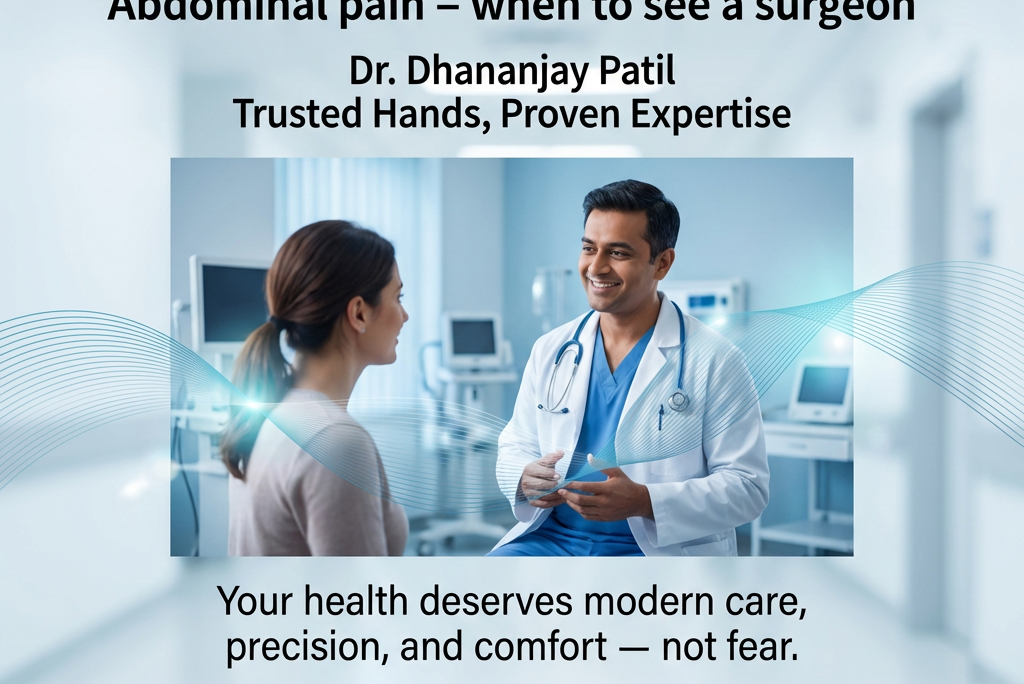 A smiling male surgeon, Dr. Dhananjay Patil, in a white coat consulting with a female patient in a bright, modern hospital setting, emphasizing expert care for abdominal pain.