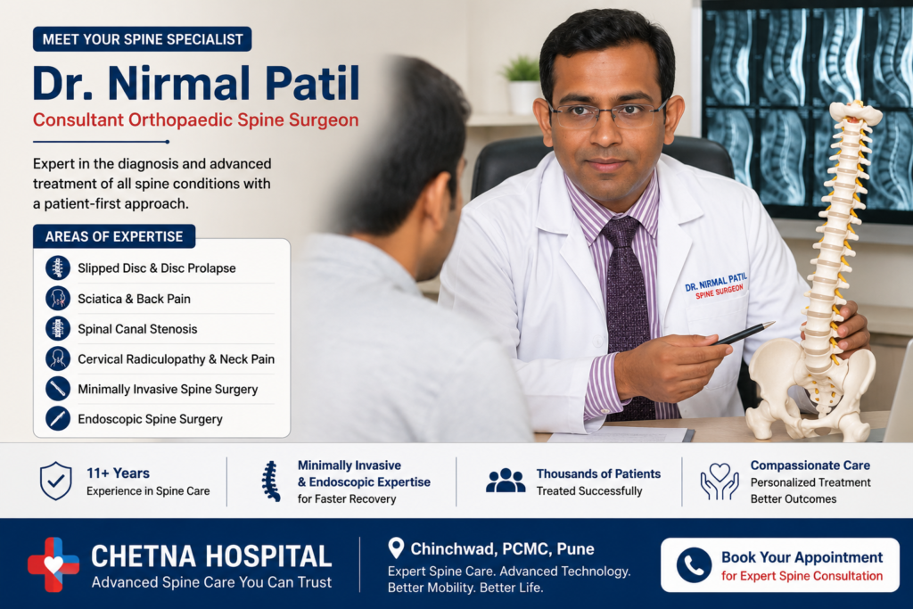 Dr Nirmal Patil consulting a patient about spine treatment at Chetna Hospital